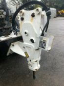 Bobcat Skidsteer. Breaker Attachment