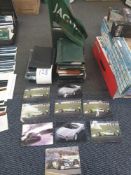 The various Jaguar dealer service parks Jaguar Racing flag and numerous Jaguar photograph