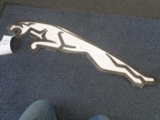 Jaguar dealer wall leaping cat