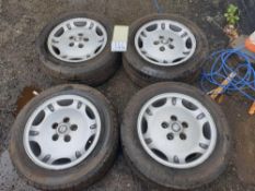 16 inch Jaguar dimple alloys with centre caps