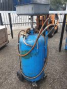 Air powered oil drainer with nozzles