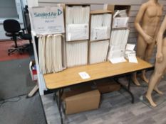 Packing bench with quantity of Jiffy bag