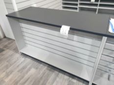 1 of 1500x900x600 shop counter display with slatwall to the front