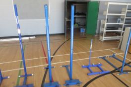 A pair of weighted badminton net stands