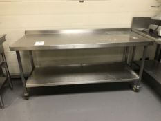 Stainless Steel Counter with Shelving Below and On Caster Wheels