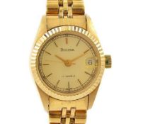 Bulova Date Gold plated Hand Wind Ladies Watch