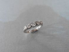 0.72ct diamond five stone ring set in 18ct gold. Graduated brilliant cut diamonds