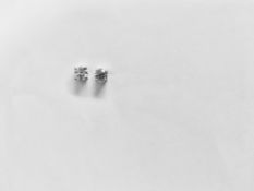 0.15ct Solitaire diamond stud earrings set with brilliant cut diamonds