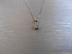 0.10ct diamond solitaire pendant set in 18ct gold. 4 claw setting