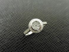 0.33ct diamond set solitaire style ring set in 9ct white gold.