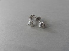 1.00ct Solitaire diamond stud earrings set with brilliant cut diamonds