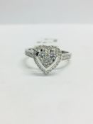 0.33ct diamond set solitaire style ring. Heart shaped with small round cut diamonds