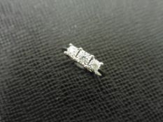 0.15ct trilogy style diamond ring set in 9ct white gold.