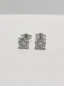 9ct white gold cluster style solitaire earrings