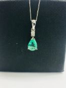 9CT White Gold Emerald and Diamond pendant