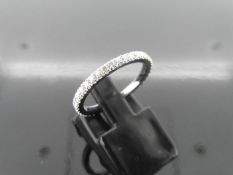 0.50ct full claw set diamond band ring set in 14ct white gold.