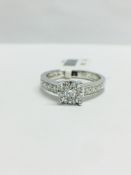 9K White gold solitaire style ring