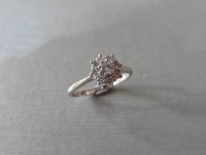 0.55ct diamond cluster ring. 9 brilliant cut diamonds