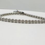9ct yellow gold diamond bracelet,1ct total diamond weight.