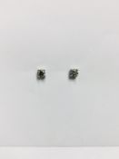 0.30ct Solitaire diamond stud earrings set with brilliant cut diamonds
