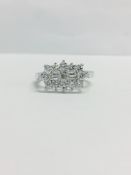 0.75ctdiamond aeroplane cluster style ring set in 9ct white gold.