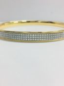 9CT YELLOW GOLD LADIES' HINGED BANGLE