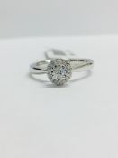 9CT White Gold diamond Solitaire illusion set ring with a millegrain edge shank