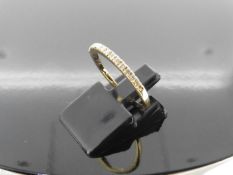 0.13ct diamond eternity ring set in 14ct yellow gold size L. I colour