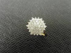 0.75ct diamond cluster ring set in 9ct gold. Brilliant cut diamonds
