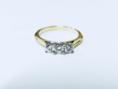 0.60ct diamond trilogy ring set in 18ct gold. Brilliant cut diamonds