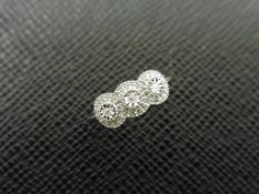 0.06ct trilogy style diamond dress ring in 9ct white gold. 3 small round cut diamonds