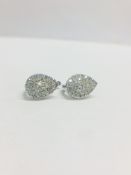 9K White gold pearshape style Diamond Earrings
