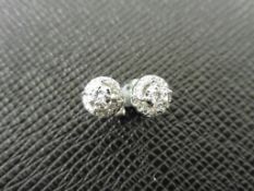 0.25ct diamond set stud earrings in 9ct white gold.