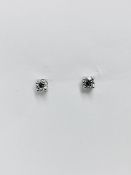 0.40ct Solitaire diamond stud earrings set with brilliant cut diamonds
