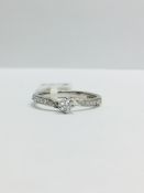 9ct White Gold diamond Solitaire twist style ring