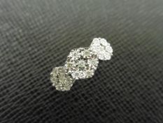 0.26ct trilogy style diamond ring set in 9ct white gold.