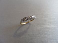 0.70ct diamond five stone ring set in 18ct gold. Graduated brilliant cut diamonds