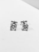 1.00ct Solitaire diamond stud earrings set with enhanced brilliant cut diamonds