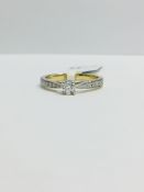 9K Yellow Gold diamond Solitaire Ring with Diamond set shoulders
