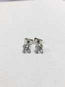 0.80ct Solitaire diamond stud earrings set with brilliant cut diamonds