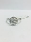 0.24ct diamond illusion set cluster ring in 9ct white gold. Brilliant cut diamonds