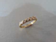 0.50ct diamond five stone ring set in 9ct yellow gold. Brilliant cut diamonds