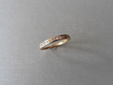 0.15ct diamond eternity ring set in 9ct rose gold. Channel setting