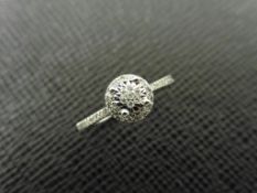 0.21ct diamond set solitaire style ring set in 9ct white gold.
