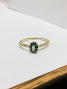 0.80Ct / 0.12Ct Green Sapphire And Diamond Dress Ring.