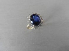 2.40Ct Sapphire And Diamond Cluster Ring Set With A Oval Cut(Glass Filled) Sapphire Which Is Surrou