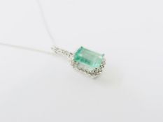 18Ct White Gold Emerald Diamond Pendant(6Mmx4Mm Emerald Cut Emerald Natural Zambian Stone)0.12Ct Bri