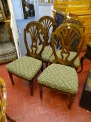 Set of four modern dining chairs
