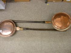 Two copper and long handled wooden bedwarmers