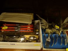 Quantity of loose and boxed cutlery and a pair of cockerel table ornaments